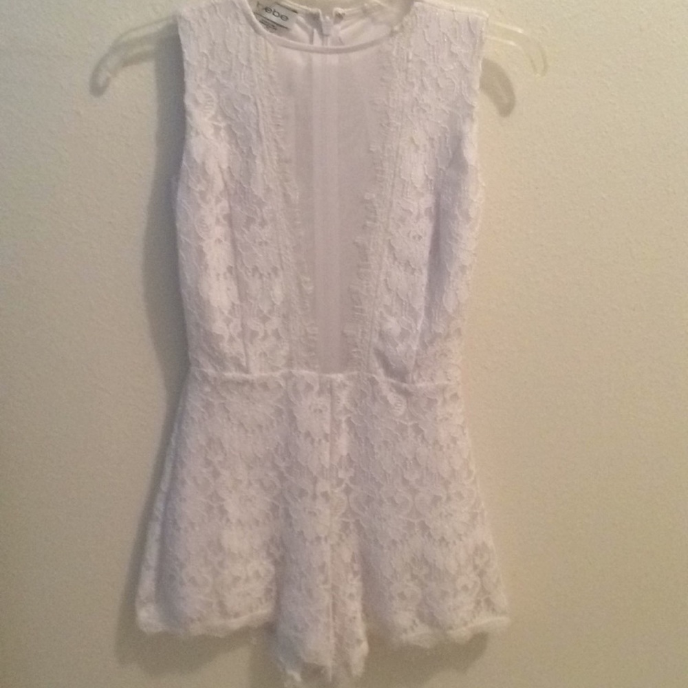 Bebe “Summer Dream” Deep V Inset White Lace Romper